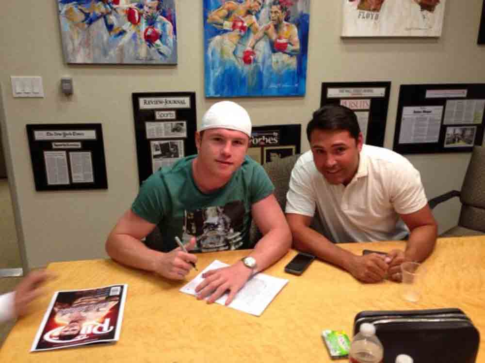 Canelo con su promotor en LA