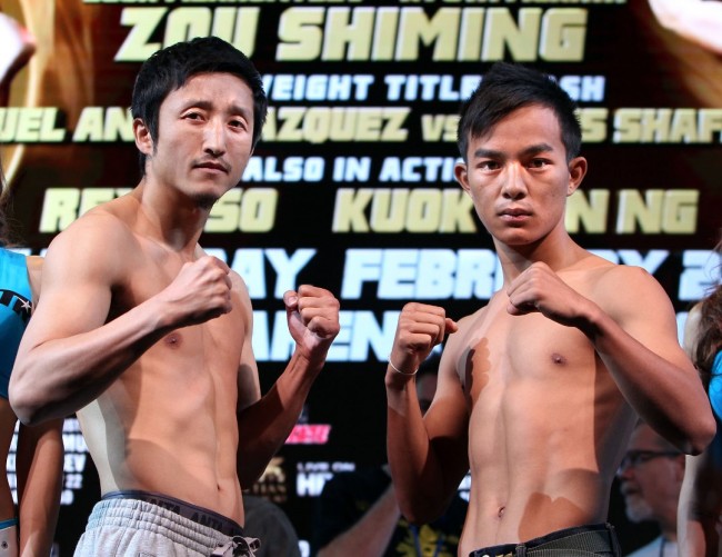 Feb. 21, 2014, Macau, China ---  "RING OF GOLD"  ---  (L-R) Two-time Olympic gold medalist Zou Shiming and Yokthong Kokietgym of Thailand weigh in (Shiming 111.8 lbs, Kokietgym 110.6 lbs) Friday at The Venetian Macao Resort for their upcoming main event on Saturday, February 22 from the Cotai Arena at The Venetian Macao Resort in Macau,China.       Shiming will risk his undefeated (3-0) record in an eight-round flyweight main event bout against the young seasoned Kokietgym.    Promoted by Top Rank®, in association with Tecate,  "Ring of Gold - Shiming vs. Kokietgym" will be televised Saturday, Feb. 22, beginning at 5:00 p.m. ET/PT on HBO 2.     --- Photo Credit : Chris Farina - Top Rank (no other credit allowed) copyright 2014