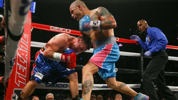 NEW YORK, NY - JUNE 6: Miguel Cotto (R) punches Daniel Geale during their WBC middleweight world championship fight at the Barclays Center on June 6, 2015 in the Brooklyn borough of New York City. (Photo by Ed Mulholland/Getty Images)